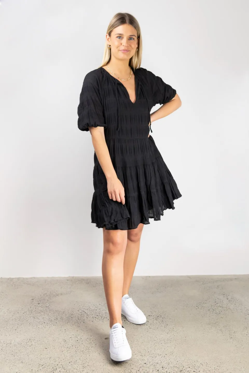 Playful Black Shirred Cotton SS V Neck Tiered Mini Dress